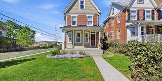 Charming Updated 4B/2.5B Home with Fenced Yard & Parking Included Gallery 1