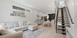 Detached Luxury 4BR/3B Retreat with Skyline Rooftop Deck, Wet Bars, Driveway & Massive Yard Gallery 1
