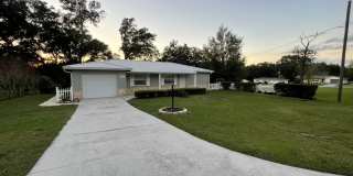 Beautiful 2/2 with large yard, Florida room, new floors, and updated bathrooms! Beautiful 2/2 with large yard, Florida room, new floors, and updated bathrooms! Gallery 1