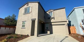 Modern 4 Bedroom 2.5 Bath Home in Gated Winding Meadow Village Gallery 3