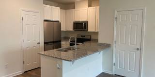 Modern Comforts Await: Welcome to Merchants Way Gallery 4