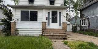 Now Leasing: 4-Bedroom Akron Home with Attic Bedroom & Basement Laundry Hookups Gallery 1