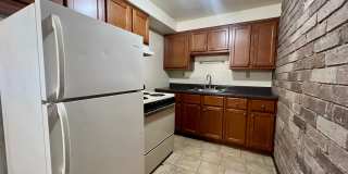 Cozy One Bedroom Apartment! Exposed Brick throughout & Laundry On-Site! Call Today! Gallery 1