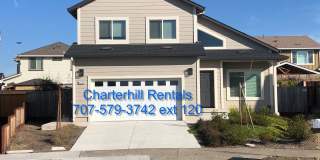 Light and bright, like new Coffey Park home with hardwood style flooring and beautiful yard Gallery 1