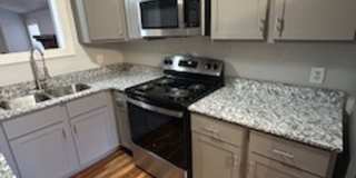Updated Four Bedroom/Two Bath/Two Car Carport/Fenced/Storage Bldg Gallery 1