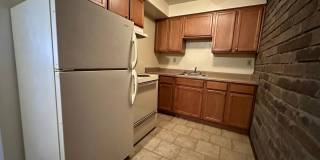 Cozy One Bedroom in Plum! Exposed Brick, On-Site Laundry & More! Call Today! Gallery 1