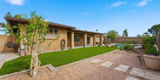 Welcome to this beautiful 4-bedroom, 3-bathroom home in Tempe Arizona! Gallery 1