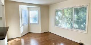 RENOVATED Top Floor. DISHWASHER! ON-SITE LAUNDRY! HARDWOOD! Gallery 1