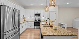 Like new modern maintenance free 3 bedroom 2.5 bath townhouse in Greensboro. Lawn care included. Gallery 5