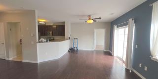 Beautiful 2nd floor (with elevator services) condominium: 2-bed, 2-bath, beautiful kitchen, bonus room, laundry room & deck! Gallery 12