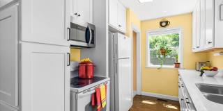 Charming Wheaton Cottage w/ Solar Panels, Finished Basement & 2-Car Garage Gallery 14