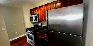 MOVE IN NOW!! Gated community Miriada! 1st floor 1X1.5 bath condo near pool area!!! Laminate wood flooring in living area and carpet in bedroom! Has washer & dryer! Gas stove & water heater! Gallery 13