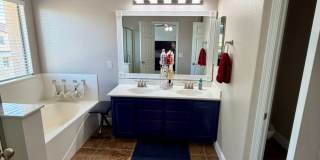Spacious 6-bedroom, 2.5-bathroom home in Chandler, Welcome to the family friendly community of Sun Groves sitting on nearly 18,000 sq ft and one of the largest lots in the neighborhood. Gallery 25