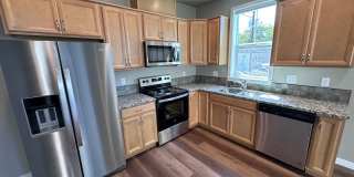 4 Bedroom / 4 bath New Townhome. Every bedroom is its own Master Suite with your own full bathroom, walk in closet and A/C unit. Full-size washer and dryer in your unit. Gallery 11