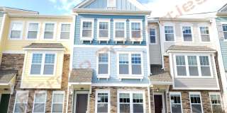 Beautiful Luxury 3 Story 3 Bedroom Townhome with 1st Floor Guest Suite, Attached 2 Car Garage, Community Pool and Fitness in Villages of Apex! Available Aug 7th! Gallery 1