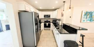 Annual furnished Updated 4-Bedroom Pool Home with Spacious Living Areas Gallery 7