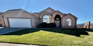 Furnished and Utilities Included: Two-Bedroom Basement Apartment with Private Yard Gallery 1