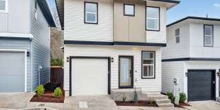 Brand-New 2-Bedroom Home with White Granite Kitchen, Open-Concept Living & Attached Garage Gallery 1