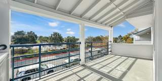 Exceptional Corner Unit w/ Wraparound South-Facing Balcony Gallery 1