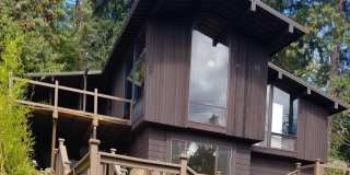 Unique Hillside Campus Home w/Floor to Ceiling Windows!!! Gallery 1