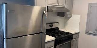 SECOND MONTH FREE! Updated 2BR/1BA in Hillcrest – Parking + Modern Kitchen Gallery 1