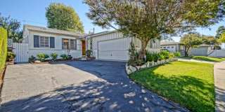 CHARMING, BRIGHT & AIRY HOLLYGLEN HOME W/ BEAUTIFULLY LANDSCAPED FRONT & REAR YARDS W/ PATIO BLOCKS TO SHOPPING, AWARD WINNING WISEBURN SCHOOLS, FREEWAY ACCESS & JUST MINS TO BEACH! Gallery 1