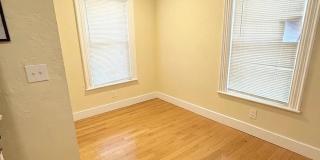 No Fee Single Family House with 5 Parking Spaces Included!  Laundry in Unit! Gallery 10