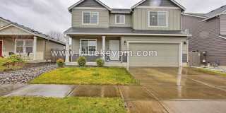 4 Bed, 2.5 Bath with Office/Den and 2 Car Garage in Orchards Fountain Village Gallery 1