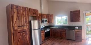 2 Bedroom 1 bath house with extra large double car garage and extra storage space! Gallery 5