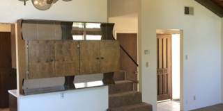 Downtown home with loft and exposed beam ceilings. Gallery 6