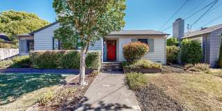 Bright & Cozy!  Conveniently located Three Bedroom Two Bath Single Level with Detached Two Car Garage! Gallery 1