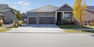 Modern 4-Bed Ranch in Erie with 13-Ft Ceilings, Solar Panels & EV Charger Gallery 1