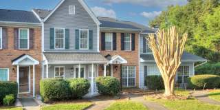 Discover this beautifully updated Raintree townhome featuring an open floor plan and a range of contemporary enhancements. Gallery 4