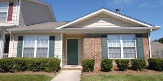 Charming 3 bedroom 2 bath Townhouse w/ fenced in yard located off Guilford College Road! Charming 3 bedroom 2 bath Townhouse w/ fenced in yard located off Guilford College Road! Gallery 1