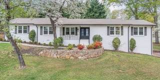 Large 3 bedroom 3 bath two story ranch home within walking distance to downtown Woodstock. Gallery 1