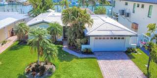 Treasure Island Three Bedroom, Two Bath Furnished Single Family Home on the water. Gallery 1