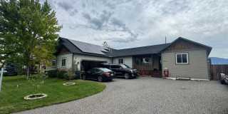 Spacious 4 Bed Home with Finished Basement, Solar, Sauna, Pool Table & Fenced Yard Gallery 1
