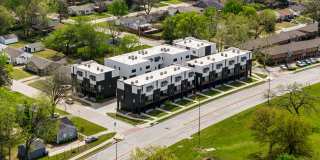 Discover modern elegance in the newly constructed Edgewater Condominiums, a boutique community featuring 18 luxurious units with 9 still available for purchase. Gallery 29