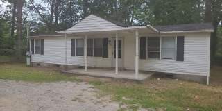 3 Bedroom 2 Bathroom with a partially fenced yard! Housing Vouchers Accepted! Gallery 1