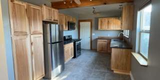 ALL UTILITIES INCLUDED - Country Home in the county on 1/2 Acre lot Gallery 1