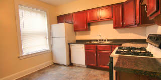 This 2 bedroom 1 bath home has been completely refinished with brilliant hardwood floors throughout! Gallery 14
