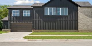 Welcome to this stunning new build in the desirable gated community of Broken Arrow, OK! Gallery 34