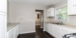 Updated Bungalow with Massive Deck and Fully Fenced Yard! Gallery 10