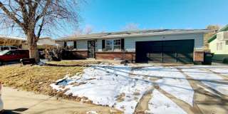 4 bed, 2 bath house with washer/dryer hookups and 2 car garage,  Great location off Chambers and 56th. Gallery 1