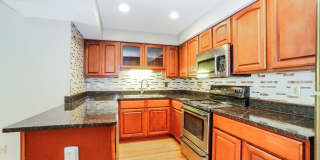 Charming 1-Bedroom Apartment with Exposed Brick, Hardwood Floors & Updated Kitchen Gallery 4