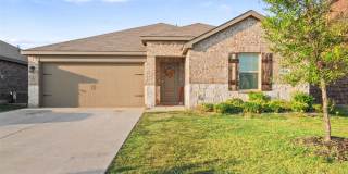 Charming 4-bedroom, 2-bath home with an open layout, spacious kitchen with oversized island, private primary suite, covered patio with TV, generous backyard, and access to a nearby community pool and playground. Gallery 1