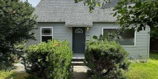 Ideally Located and Updated 4 Bed 2 Bath Fully-Fenced Home w/ Detached Garage/Shop! Gallery 1