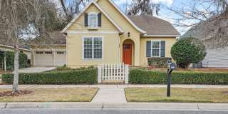 A Sunlit Custom Yellow Cottage in Greystone - Where Comfort Lives! Gallery 1