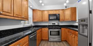 Welcome home to this light-filled, updated 4Bd/3.5Bth brick TH nestled in the sought-after Boniwood Plat! Gallery 3