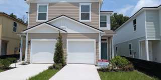 PRE-LEASING - NEW 2026 VILLA CONSTRUCTION!! 3/2.5/1 with premium finishes in the a new development community of in Hansen Creek - conveniently located just off I-295 and Lem Turner. Gallery 1